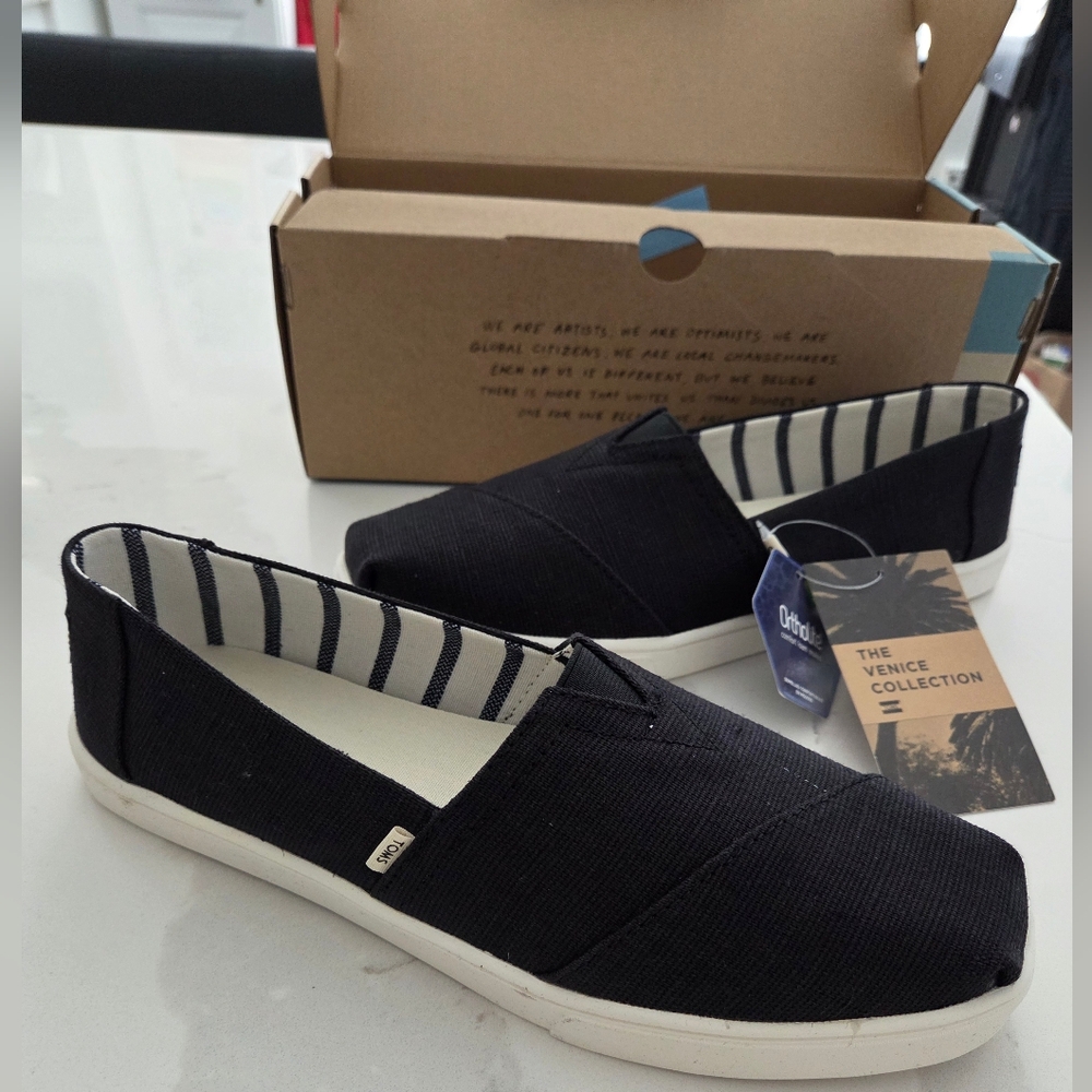 Toms Black Canvas Slip-Ons